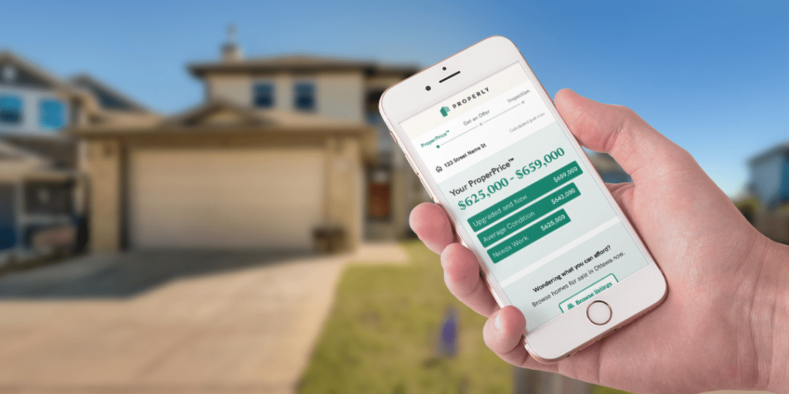 mobile phone showing home value in front of house